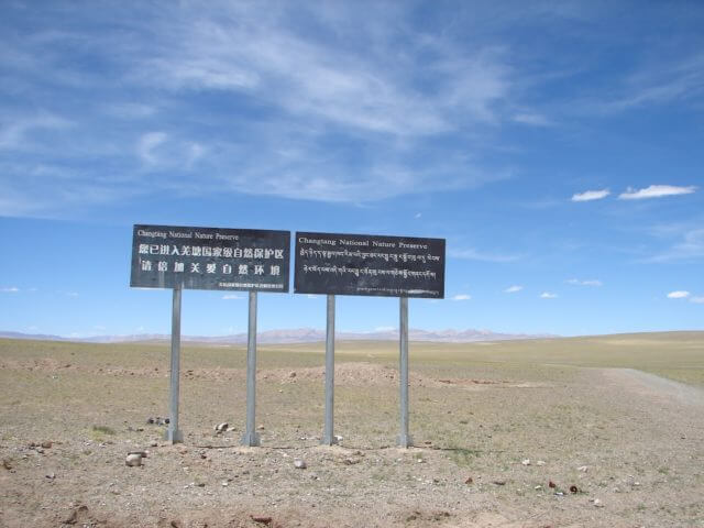 Two signs for the Changtang National Nature Preserve, marking the entrance.