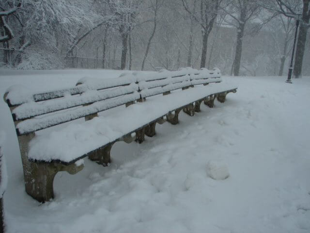 A snowy bench